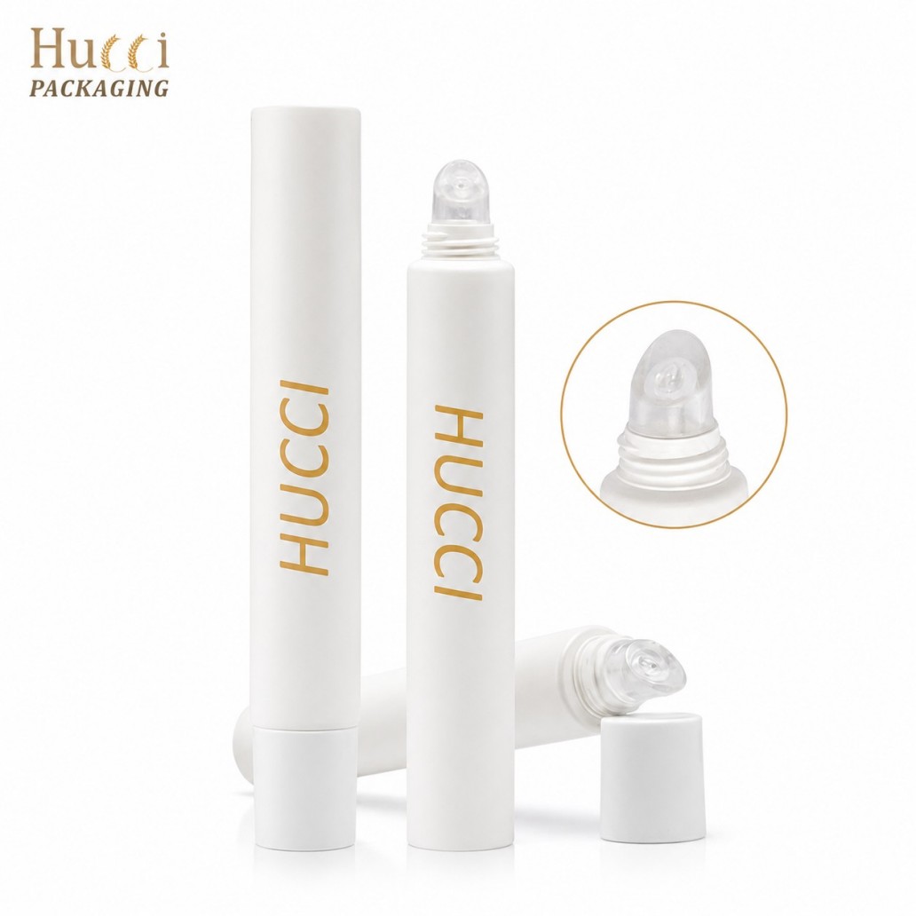Matte white PE cosmetic tube with clear silicone roller ball tip wholesale lip oil serum squeeze tube