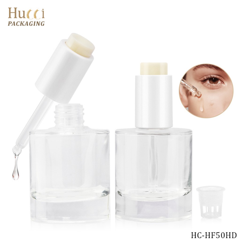 HUCCI 50ml Clear Glass Dropper Bottles with Serum Droplet & Eye Application Close-up