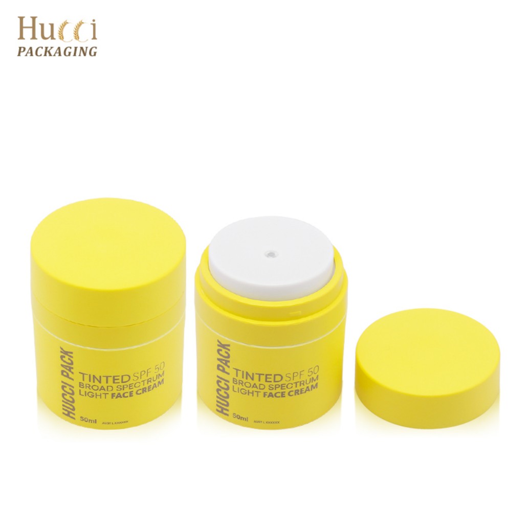 HUCCI 50ml Yellow PP Airless Pump Face Cream Jar with Cap 3-Piece Set White Background