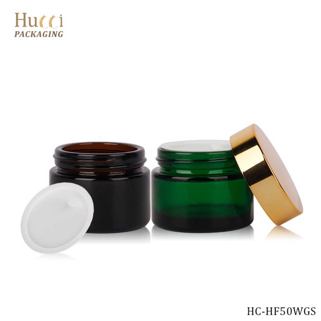 50ml Opened Amber & Green Glass Cream Jars with PP Sealers & Gold Caps White Background Display