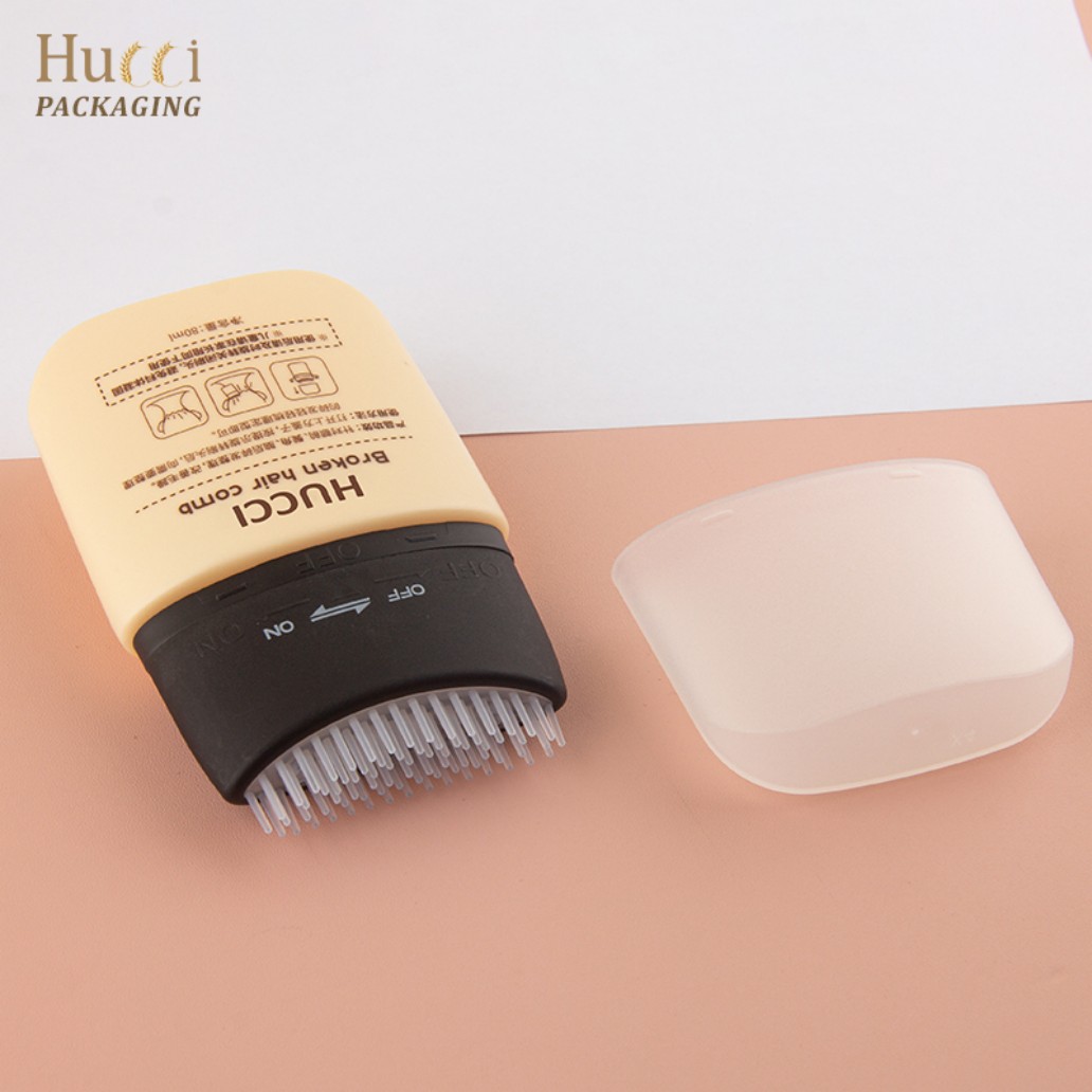 HUCCI 80ml HDPE Broken Hair Comb Bottles Capped & Opened with Scalp Application Close-up White Background}
