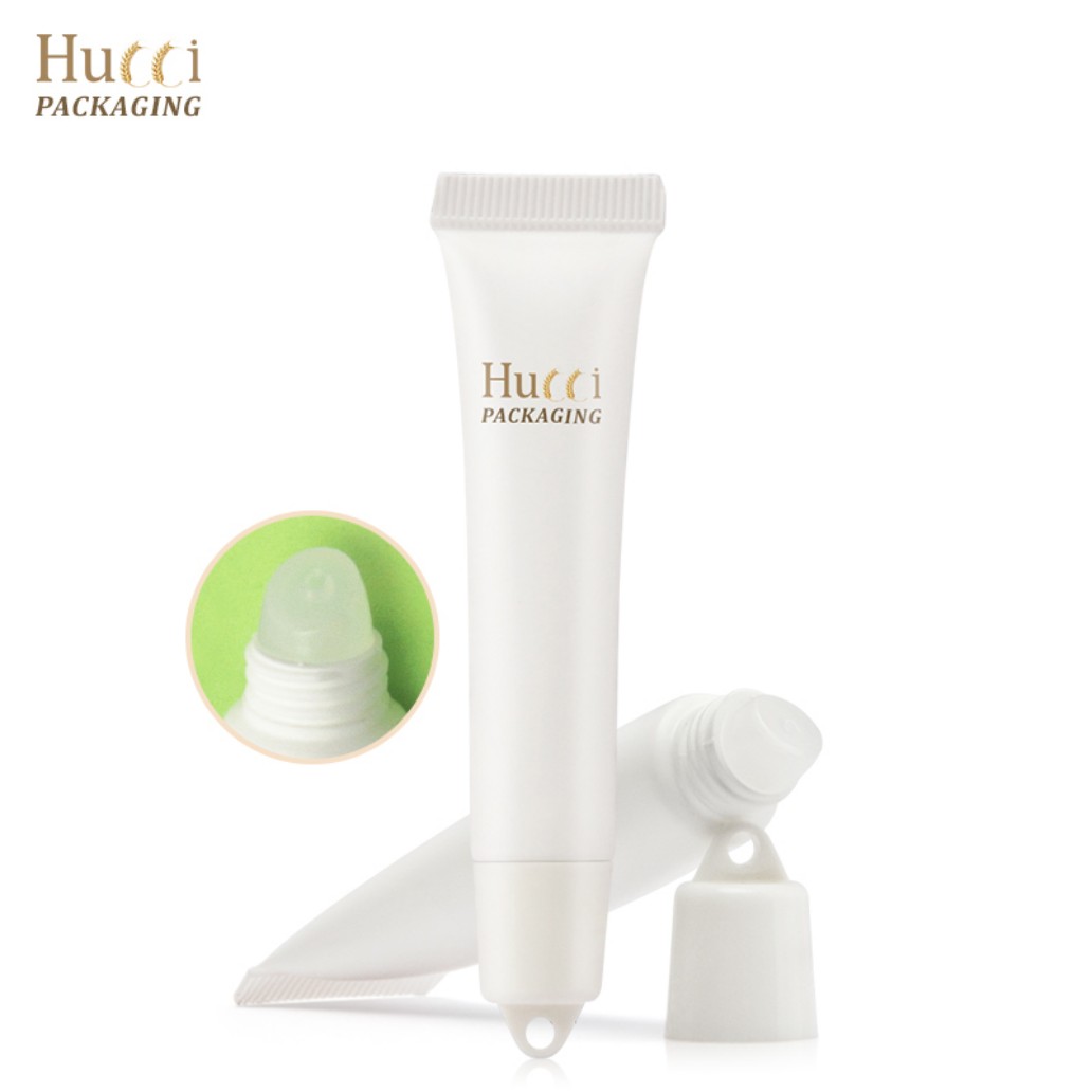 Empty White PE Tube with PP Hanging Cap Lying on White Background, Custom Cosmetic Packaging Wholesale.