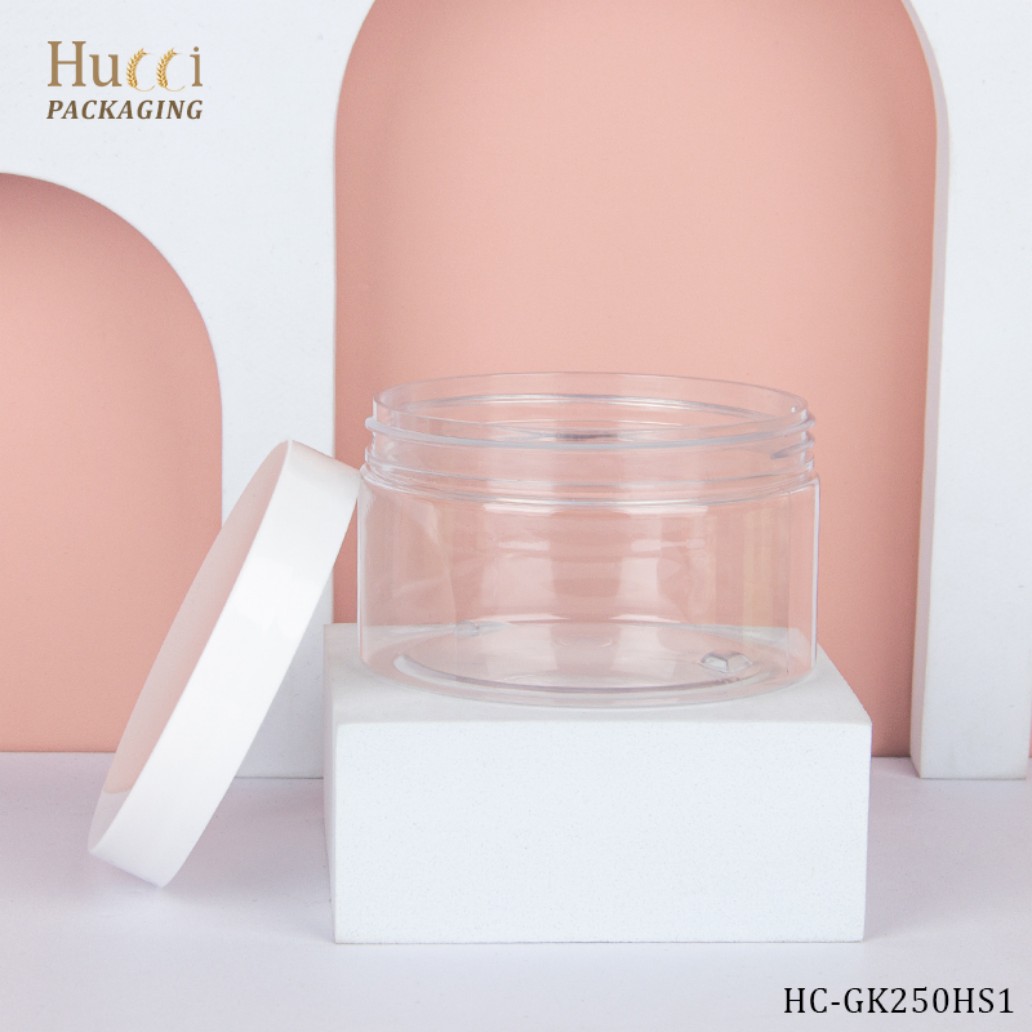 250g Transparent PET Wide Mouth Cream Jar with White Cap on Display Stand, Custom Logo Printing Wholesale.}